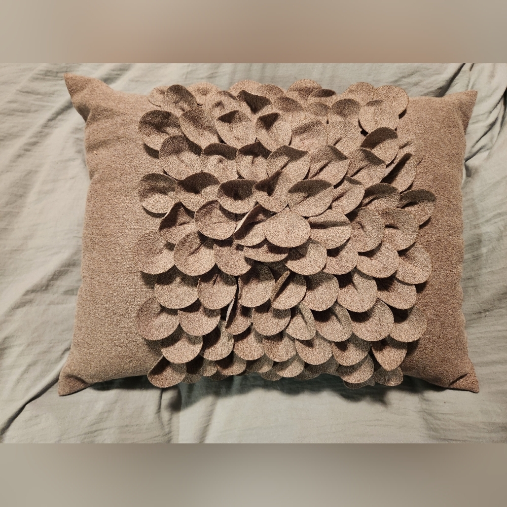Light purplish brown decorative toss pillow.